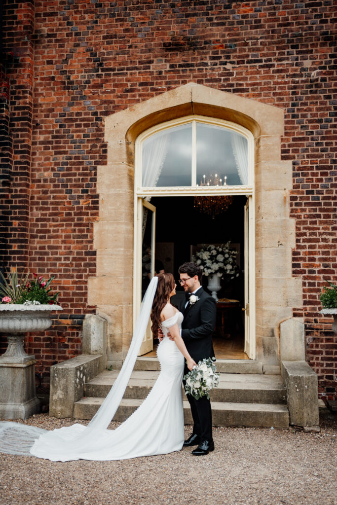 Bride and groom kiss