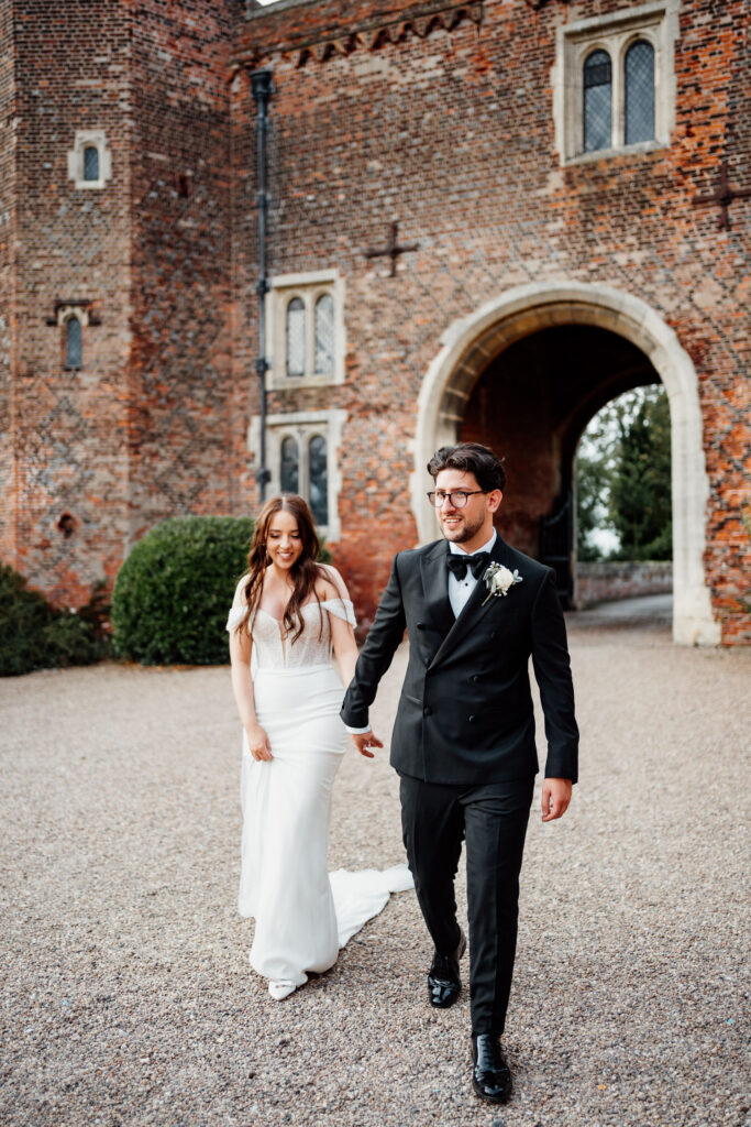 Bride and groom walk together