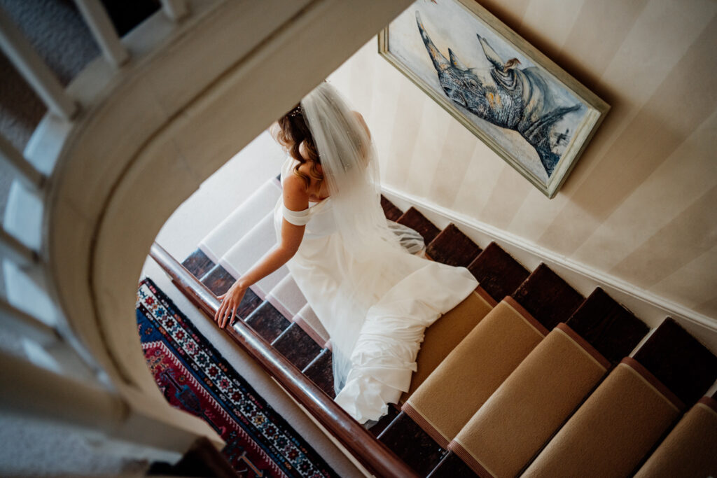 bride walking down stairs