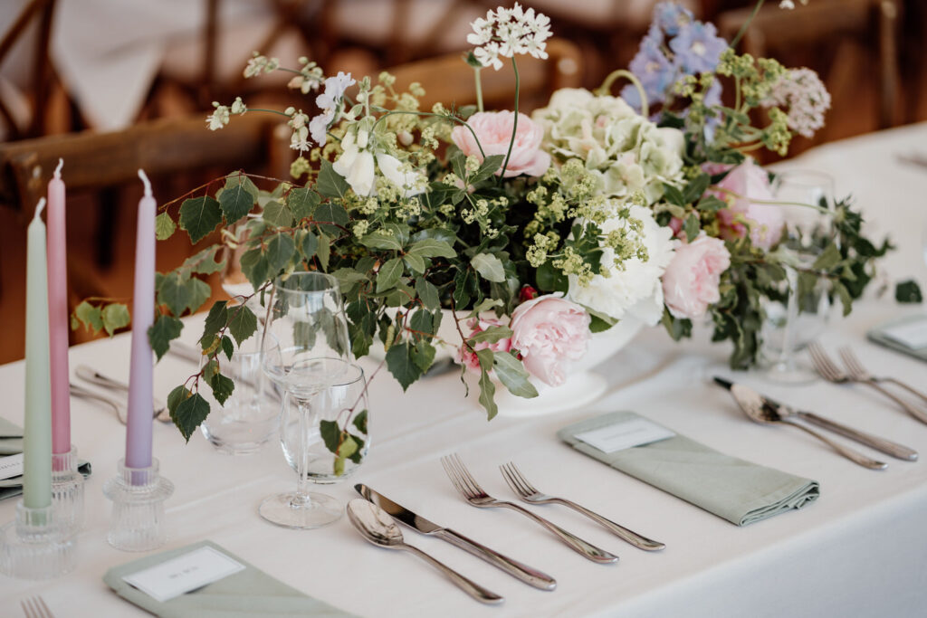 wedding marquee table setting with florals